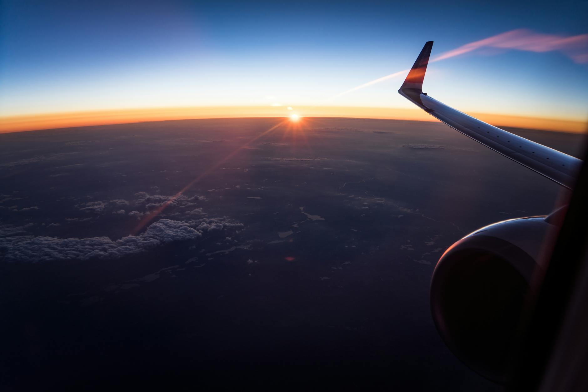 aerial view of white clouds during sunset