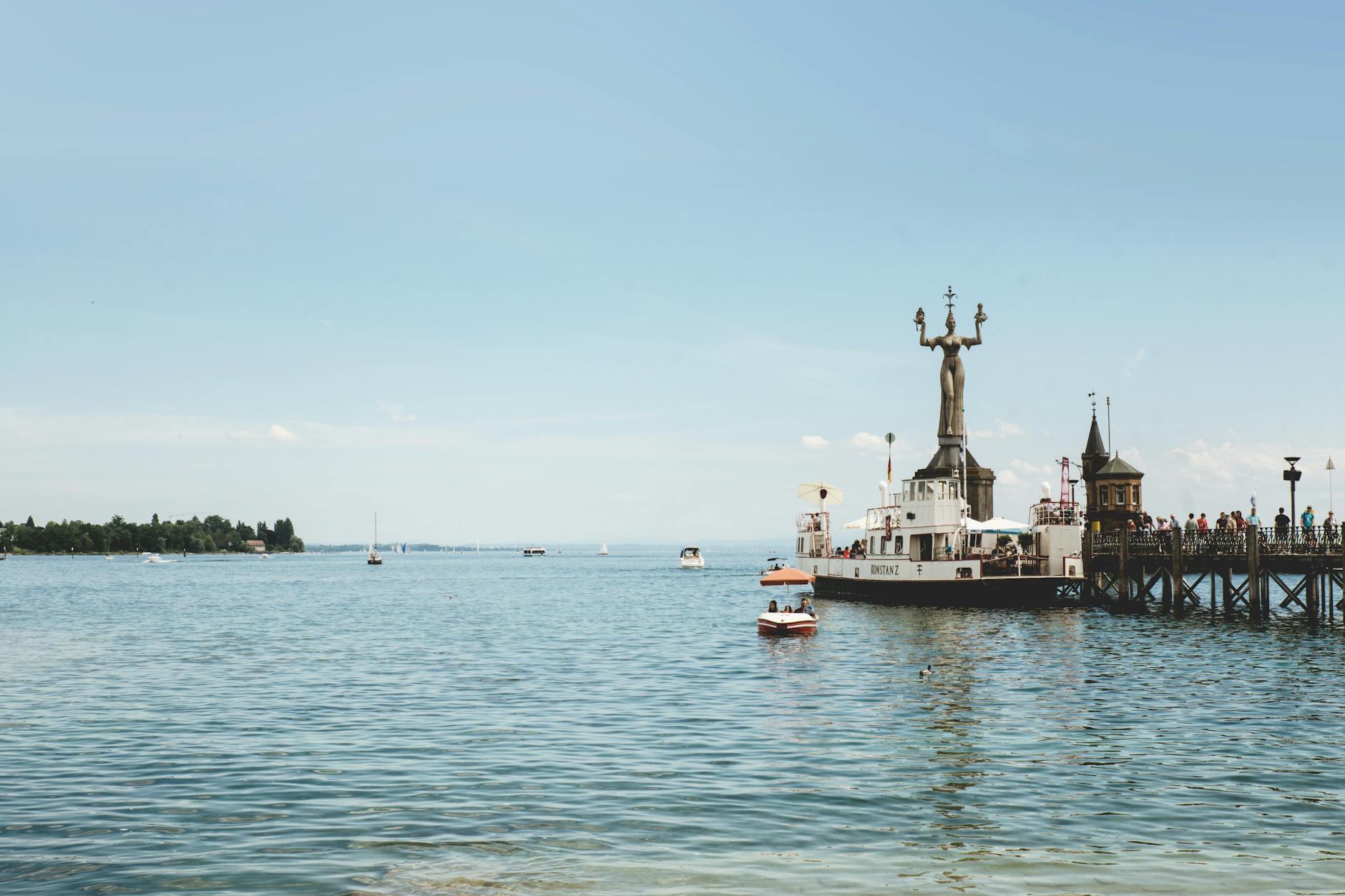 people walking on boat dock