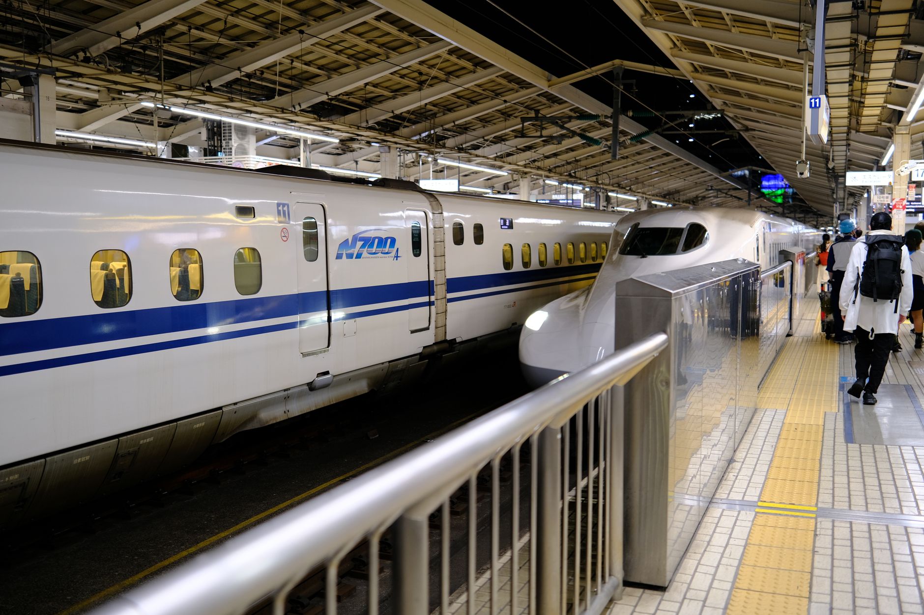 trains at railway station in tokyo in japan